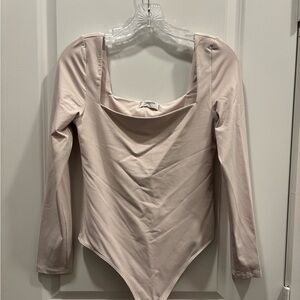 Aritzia Light Pink Long Sleeve Bodysuit